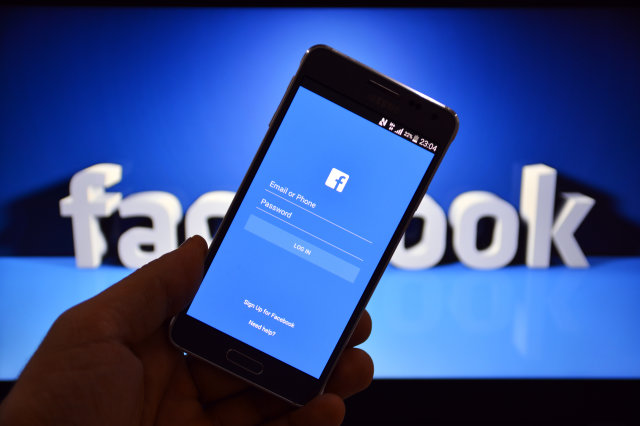 facebook login screen in mobile with blue background